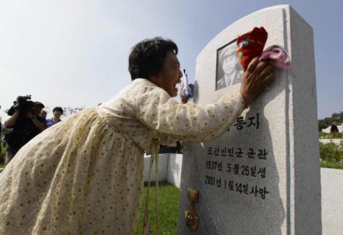 A North Korean woman mourns for her father, who died in the Korean War